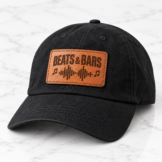 Beats and Bars leather patch baseball hat on white tile