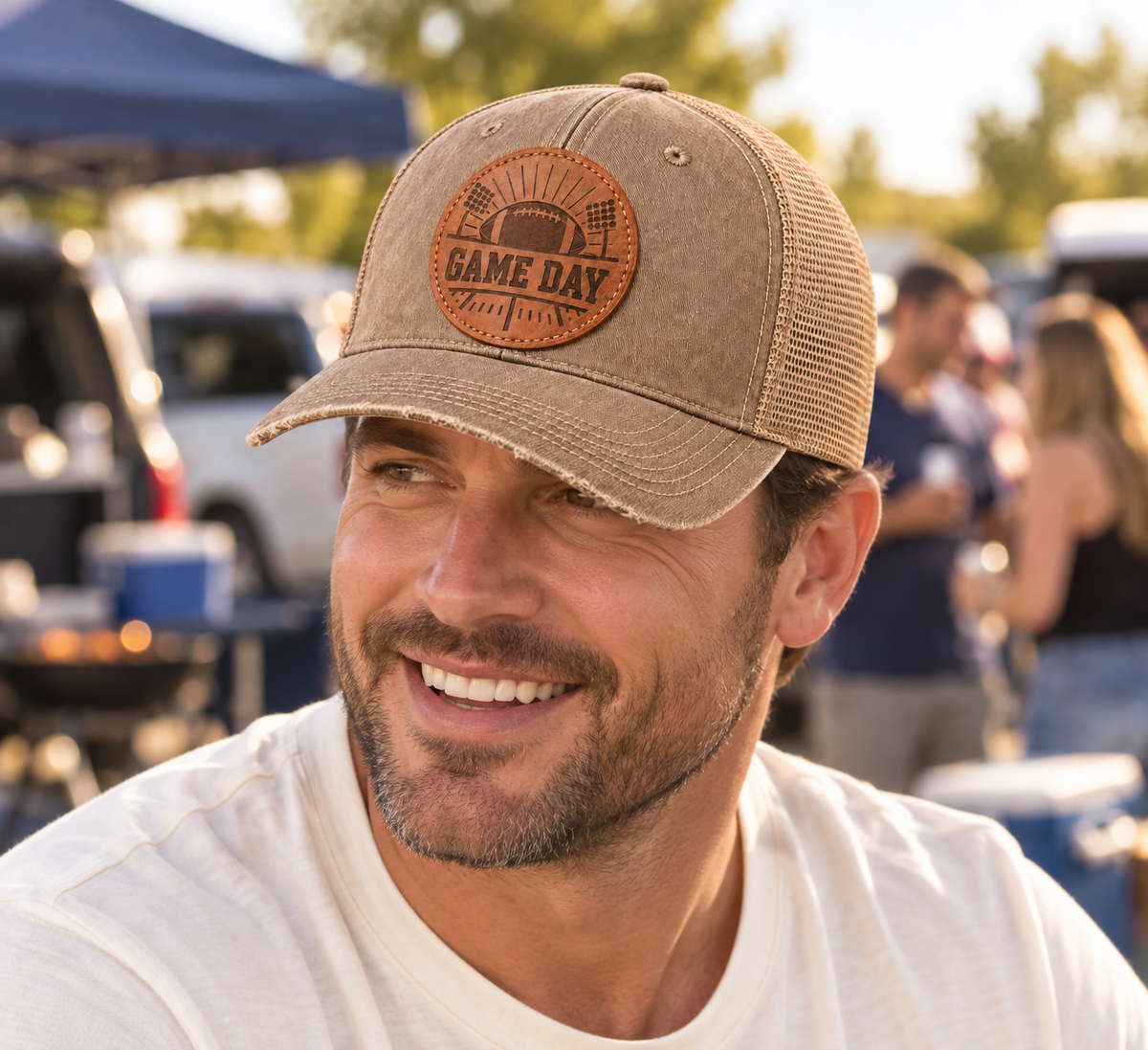 Man wearing the all-tan Game Day football leather patch cap