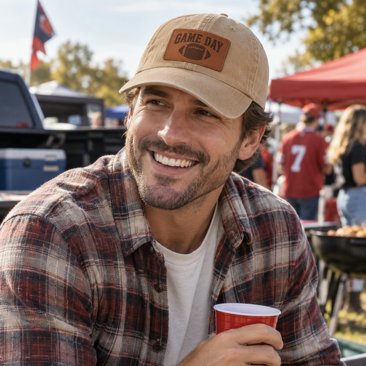 Man wearing Game Day leather patch cap