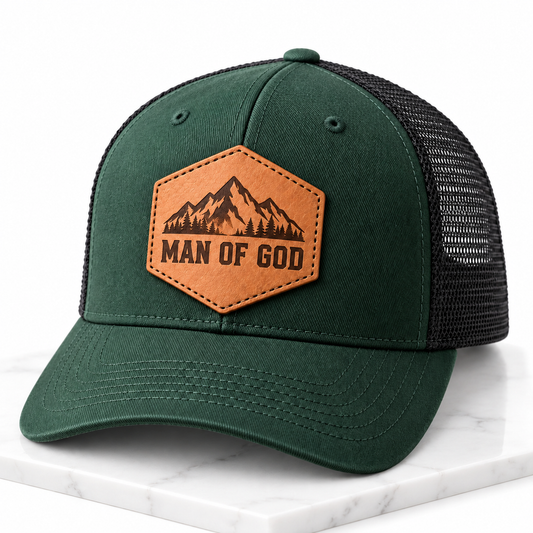 Man of God leather patch trucker hat on white tile