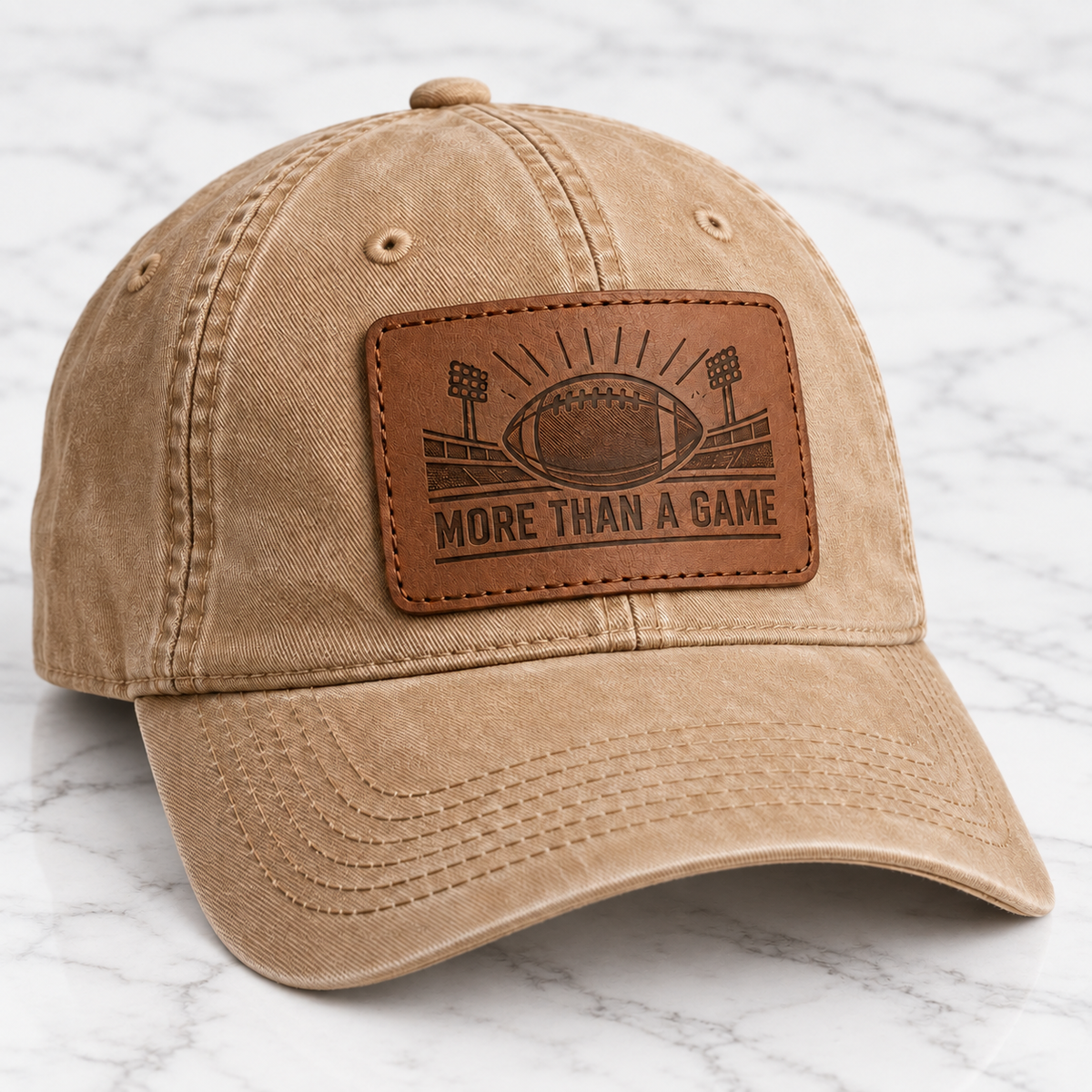 More Than a Game leather patch baseball cap on white marble tile